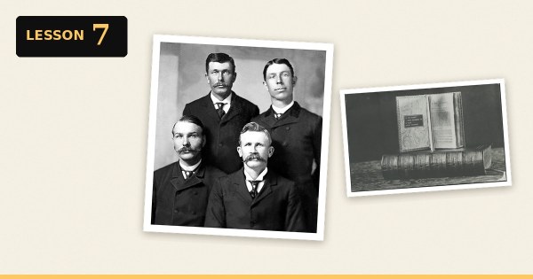 Elder Soren Petersen (bottom right) with Elder Willard Bean standing behind him and two other missionaries, beside the Book of Mormon